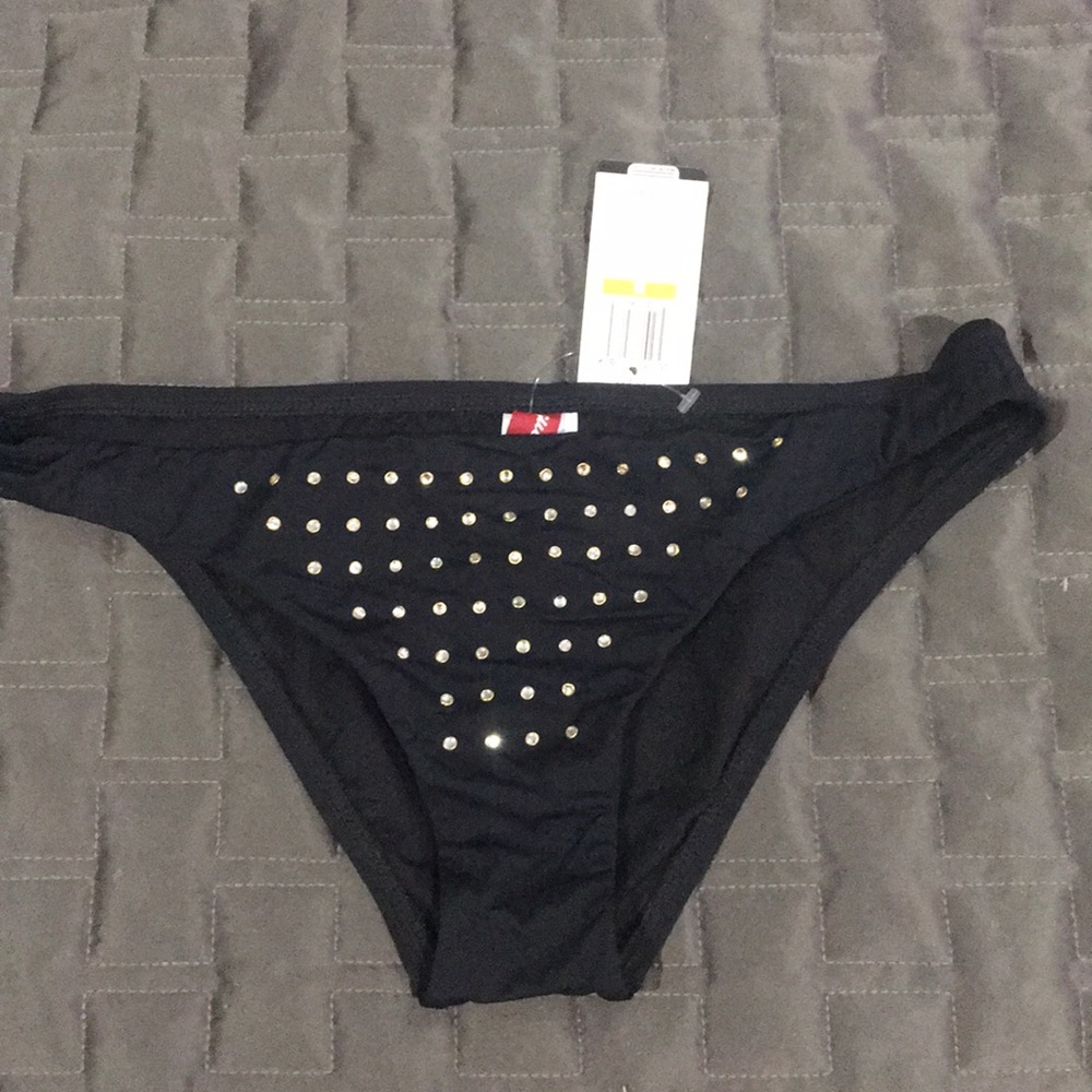 Guess swimming bottoms with metallic studs.